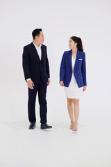 business woman and a smiling businessman standing on a white background.