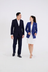 business woman and a smiling businessman standing on a white background.