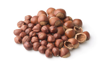 Heap of whole and shelled hazelnuts