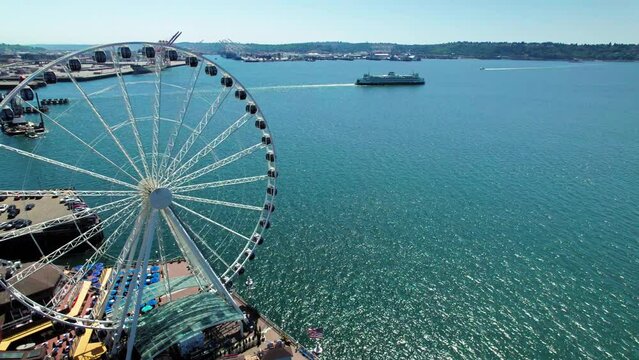 Waterfront Ferris Wheel and Ferry Boat Drone Video