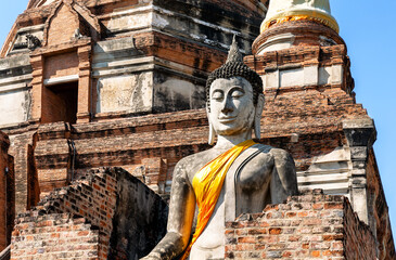 Big Buddha statue in front of temple Wat Yai Chai Mongkol (or Mongkhon) in Ayutthaya Historical Park, Ayutthaya province, Thailand.