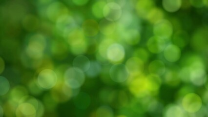 Loopable abstract background of a green natural bokeh - Powered by Adobe