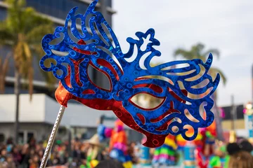 Wandaufkleber Carnival mask in front of the street during Carnival Parade, Limassol, Cyprus © Olga