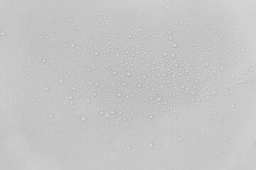 Water droplets on a gray background.