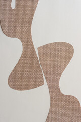 two scrapbook paper cutouts featuring organic shapes with lyrical edges and an elegant aesthetic