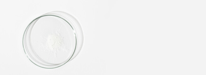 White powder in a Petri dish. Cocaine, cannabinoid, medicinal powder, antibiotic. lab, research.