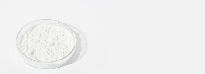 White powder in a Petri dish. Cocaine, cannabinoid, medicinal powder, antibiotic. lab, research.