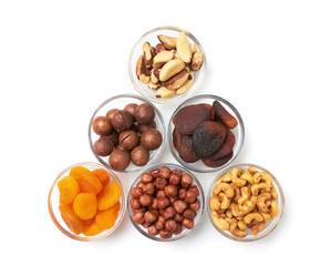 Set of nuts and dried apricots in a bowls