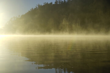 Fototapeta premium Fog over the mountain lake
