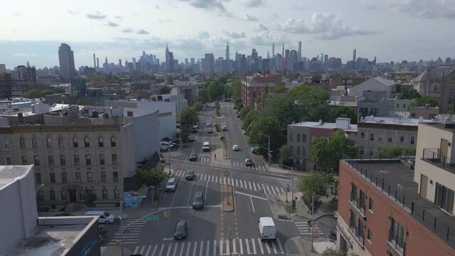 flying over McGuinness Blvd. in Greenpoint towards NYC skyline