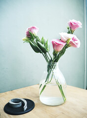 Fresh pink Lisianthus flowers in a jar