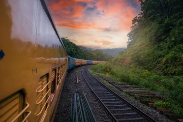 View from Indian train to unique and amazed nature scenic landscape of rain forest near Dudhsagar Falls. Goa, India. Tourism beautiful destination place.  Discover India. Open world after covid-19 © Oleksii Hlembotskyi