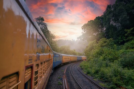 View from Indian train to unique and amazed nature scenic landscape of rain forest near Dudhsagar Falls. Goa, India. Tourism beautiful destination place.  Discover India. Open world after covid-19