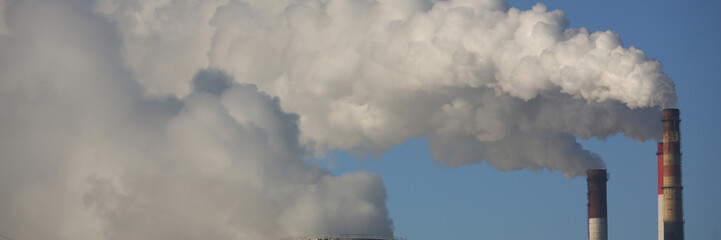 Gas thermal power plant with huge pipes smoke and steam. Combined heat and power plant concept
