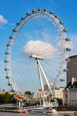 View of London Eye - observation wheel on the South Bank of the River Thames in London. - 614234557
