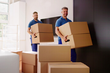 Fototapeta premium Movers Delivering Packaging Boxes