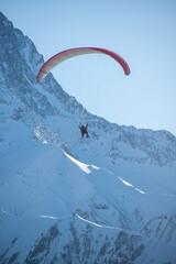Paragliding over the snow-covered French Alps, January 2023, Les Deux Alpes (3/9)