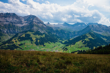 Fototapeta premium Adelboden, Switzerland - July 24, 2022 - Summer view of Adelboden village and city center