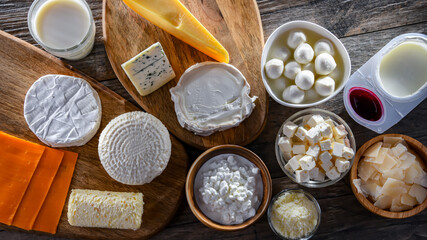 Fototapeta na wymiar A variety of dairy products including cheese, milk and yogurt
