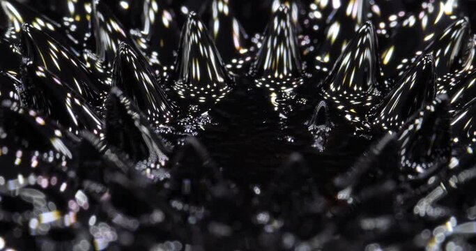 Magnetic fluid. Ferrofluid. Black liquid surface. Abstract background.