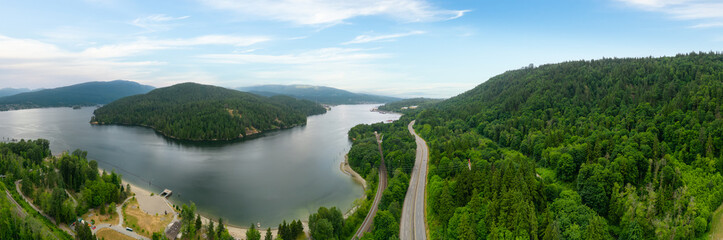 Aerial View of a Highway in City. Cloudy Sky.