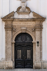 Obraz premium old wooden door in a church