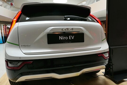 Rear view of compact Korean crossover battery electric SUV car Kia Niro EV in white color, displayed on electric car expo in Bratislava, Slovakia.