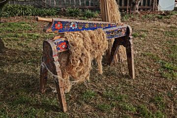 old wooden tool used for breaking hemp or flax stalks to make textile fiber, spun, fabric, rope