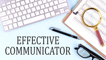 Effective communicator text on a blue background with keyboard and clipboard, business concept