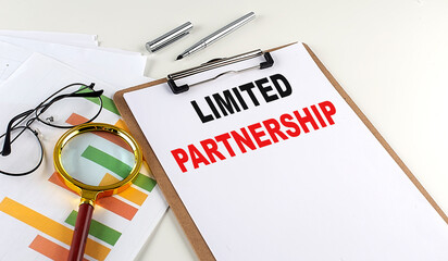 LP Limited Partnership text on clipboard on white background, business concept