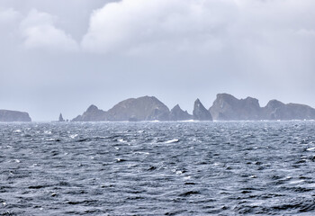 Fototapeta na wymiar Dramatic skies, landscapes and weather off the coast of Cape Horn Argentina