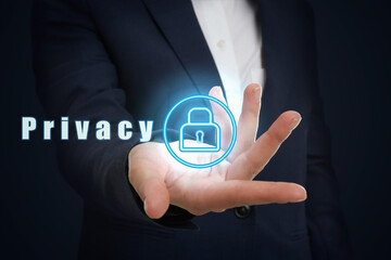 Privacy policy. Businesswoman holding button with padlock against dark background, closeup