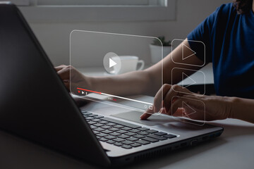 Video streaming on internet. Woman watching online movie or TV series on laptop. Video on demand technology, subscription based live digital stream or channels, multimedia player with play button.