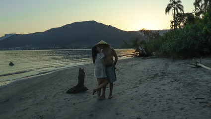 couple in romantic afternoon on the coast of São Paulo Ubatuba Barzil
