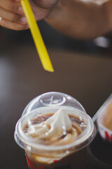 Mocha Float drinks ice cream topping ready to drink with yellow plastic straw
