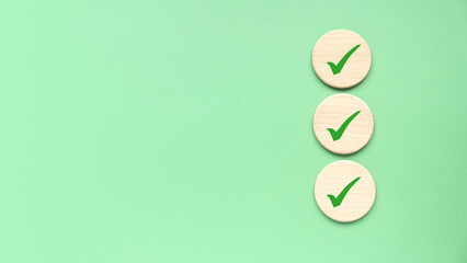 Checklist concept. Accomplishment of objectives or goals. To do list. Planning and verification. Checkmark over a green background. Copy space.