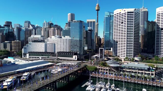 Drone aerial city view over aquarium Martin place city landscape Centre point Sydney Tower CBD travel tourism Sydney NSW Australia 4K