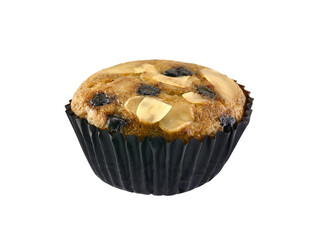single banana cupcake with grape berry and almonds topping in pleat paper cup isolated on white background, cereal muffin for tea time or birthday party, selective focus