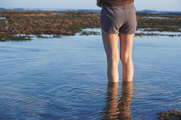 woman walking on the beach