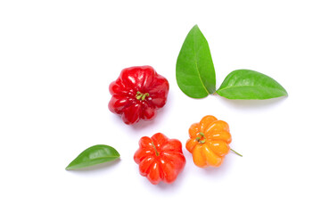 Surinam cherry (Brazilian cherry, cayenne cherry, Pitanga) with leaves isolated on white...