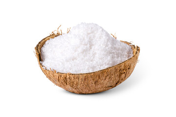 Coconut milk powder (shredded coconut, coconut flour) in coco nut shell isolated on white background with clipping path.