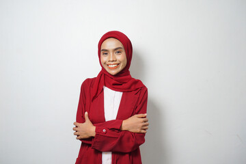 Asian business Muslim woman ini red casual smiling happy and looking confident