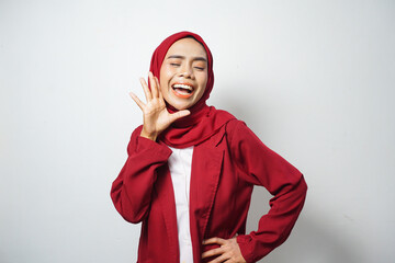 Asian business Muslim woman ini red casual smiling happy and looking confident