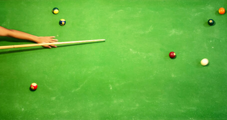 placing snooker. Cue and pool balls for pocket from top view