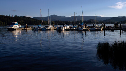 A view of the boats at the dock on a late summer evening