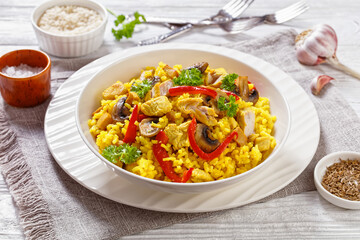 Chicken Paella with mushrooms, red pepper, spices