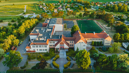 Primary school on Sobieszewo Island, Gdańsk, Poland. Drone view.