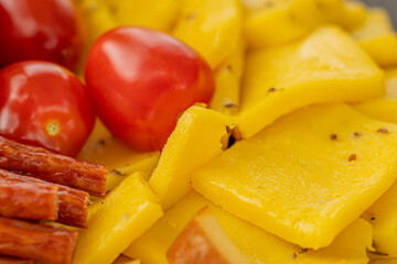 Cheese snacks in one container. Sliced cheese in different shapes. Cheese board for the celebration