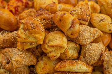 Cheese buns with spices, salty snacks. Bread with cheese filling