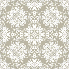 Classic seamless pattern. Damask orient ornament. Classic vintage golden and white background. Orient ornament for fabric, wallpaper and packaging
